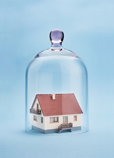 A house protected under a glass dome